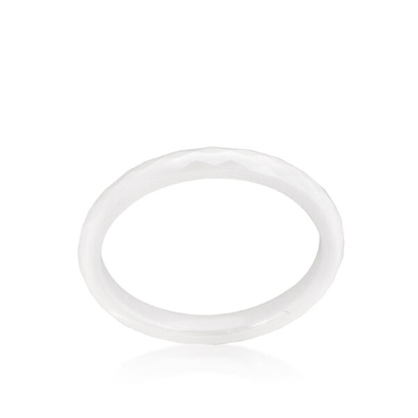 White ceramic band ring.