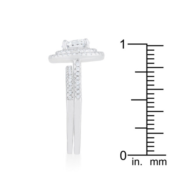 Round cubic zirconia prong-set wedding ring set, rhodium plated over lead free alloy (brass).