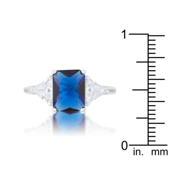 9mm trillion-cut genuine sapphire-colored cubic zirconia in prongs on a rhodium plated over lead free alloy (brass) classic bridal ring.