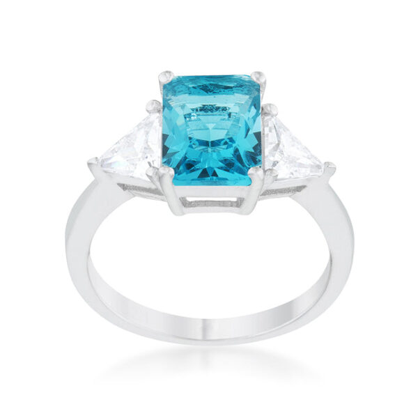 Bridal ring with trillion-cut, blue topaz-colored cubic zirconia held in prongs and rhodium plated over lead free alloy (brass).