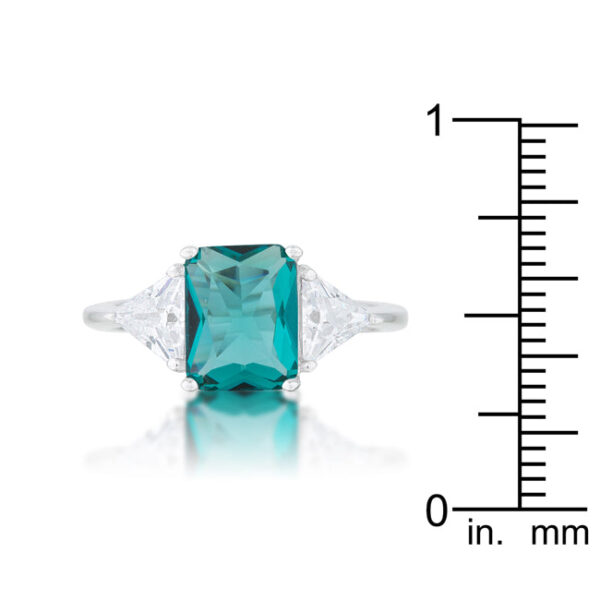 9mm aqua trillion-cut cubic zirconia in a prong setting on an engagement ring