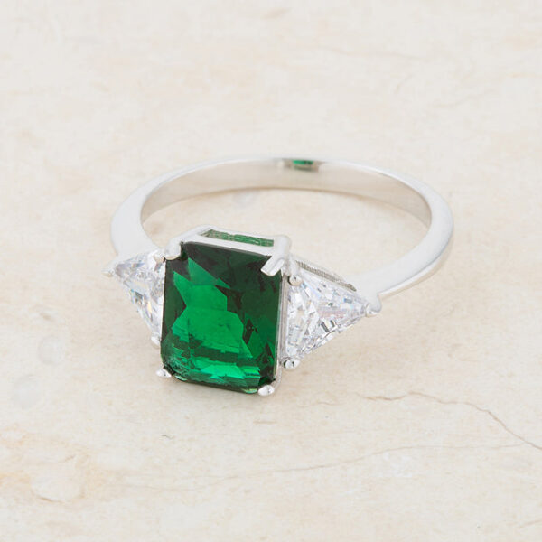 Classic bridal ring with genuine emerald-colored trillion-cut cubic zirconia in prongs and rhodium plated over lead free alloy (brass).