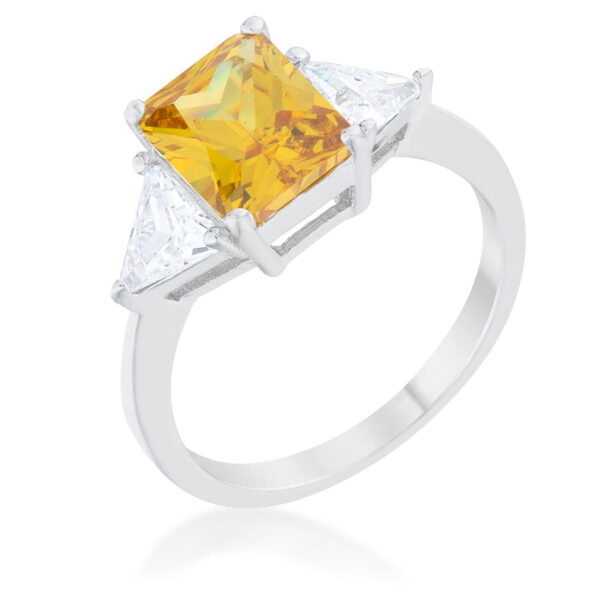 Ring with a canary yellow center stone and trillion cut stones set in prongs