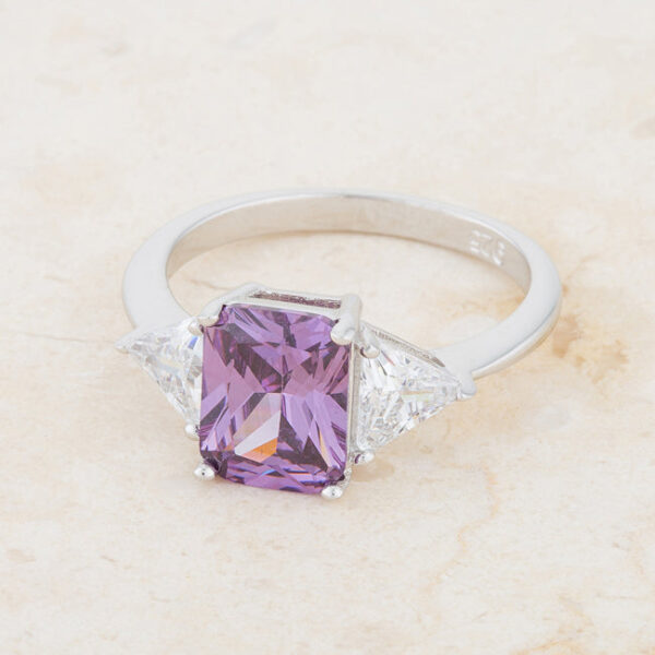Rhodium plated over .925 sterling silver ring with genuine sapphire and cubic zirconia