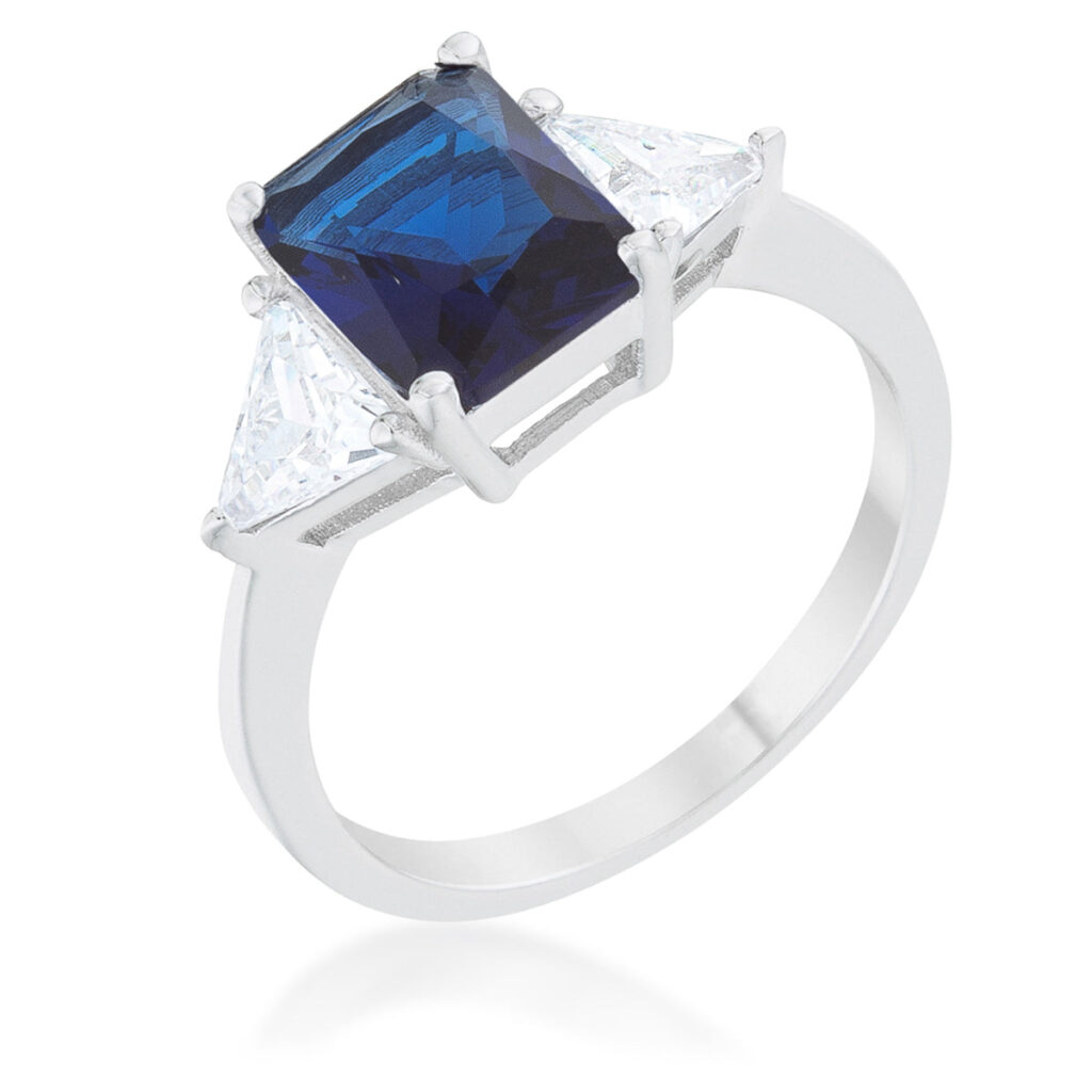 Sapphire-colored cubic zirconia ring in a radiant-cut prong setting, rhodium plated over .925 sterling silver.