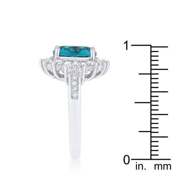 Aqua cubic zirconia classic ring measuring 2.5mm in width, with baguette and round stones in prong settings.