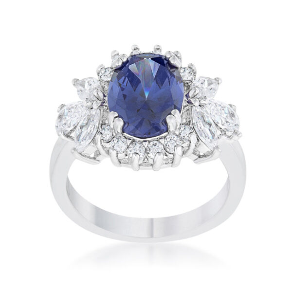 Round tanzanite-colored cubic zirconia prong-set in a classic rhodium plated over lead free alloy (brass) ring.
