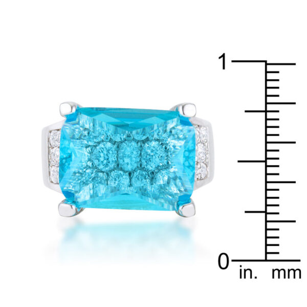 Round 2.25 Mm aqua cubic zirconia accent stones held in prongs on a cocktail ring