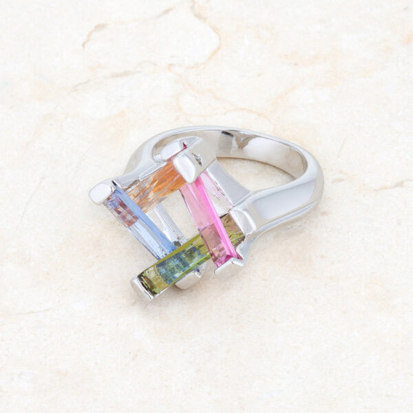 Multicolor cocktail ring with purple radiant-cut cubic zirconia and 10 ct total stone weight.