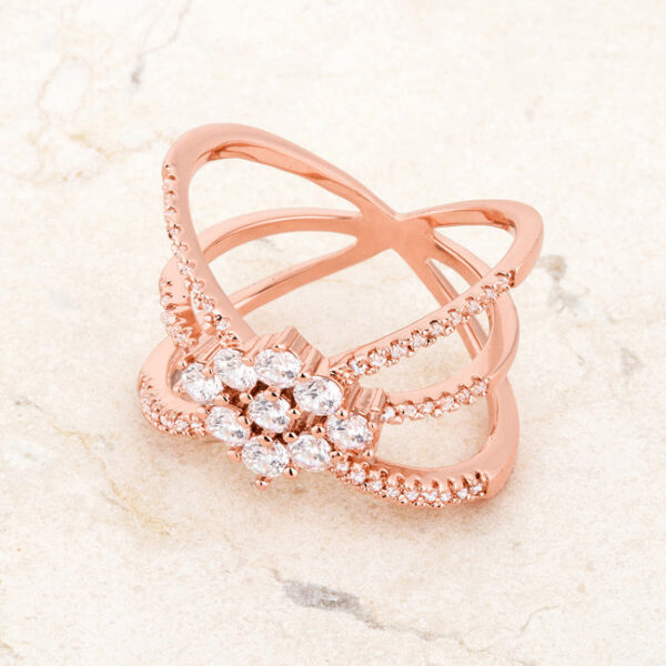 Rose gold tone over lead free alloy (brass) triple-wrap ring with round cubic zirconia in prongs.