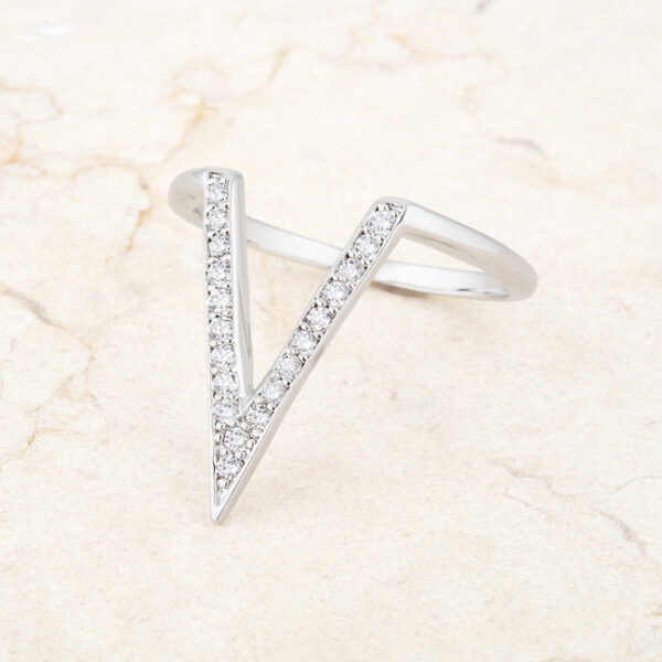 Contemporary V-shape ring with 0.2 ct total carat weight of cubic zirconia in rhodium plated over lead free alloy (brass).