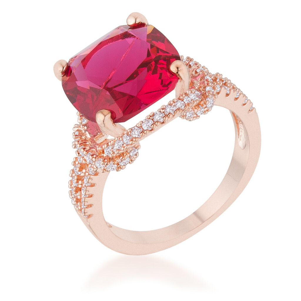 Classic statement ring in rose gold tone over lead free alloy (brass) with ruby-colored cubic zirconia in a prong setting.
