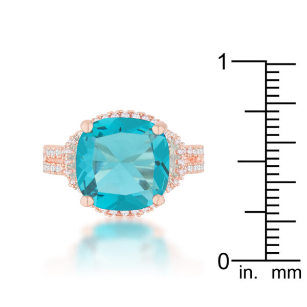 Classic statement ring featuring aqua cubic zirconia in cushion and round cuts, held in prongs.