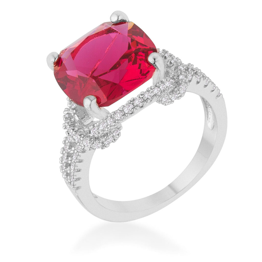 Round ruby-colored cubic zirconia statement ring in a prong setting, rhodium plated over lead free alloy (brass).