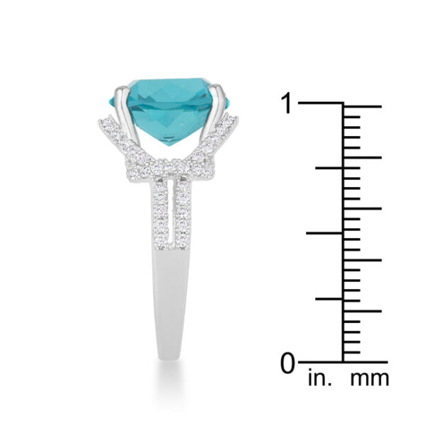 Aqua cubic zirconia statement ring with 6.2 ct total carat weight in rhodium plated over lead free alloy (brass).