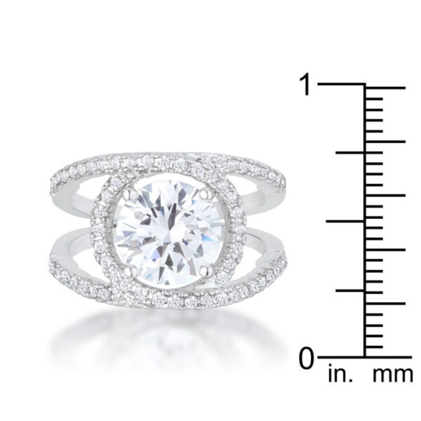 Round cubic zirconia held in prongs on a rhodium plated over lead free alloy (brass) ring.
