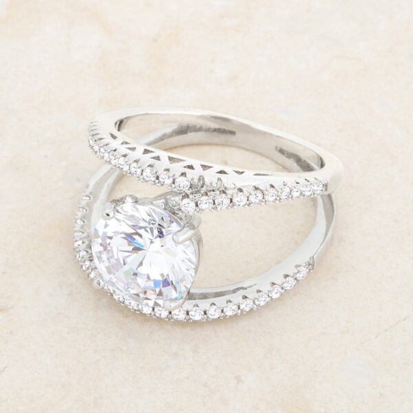 Clear cubic zirconia ring with 3 ct total carat weight in rhodium plated over lead free alloy (brass).