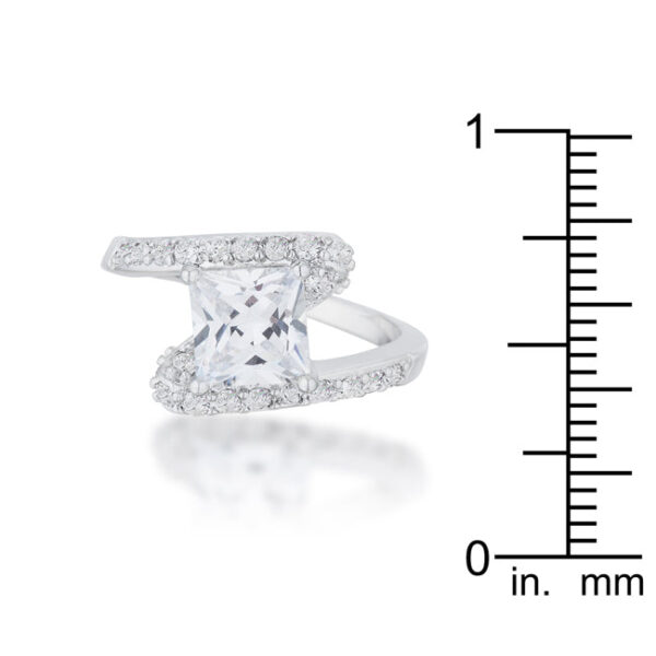 Round 7 Mm cubic zirconia held in prongs on a rhodium plated over lead free alloy (brass) ring.