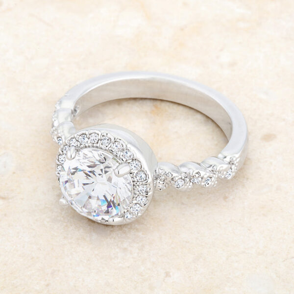 Classic 3mm ring with clear round 1 Mm cubic zirconia held in prongs.