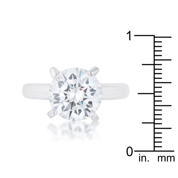 Round 10.5mm cubic zirconia prong-set ring with a rhodium plated over lead free alloy (brass) band.