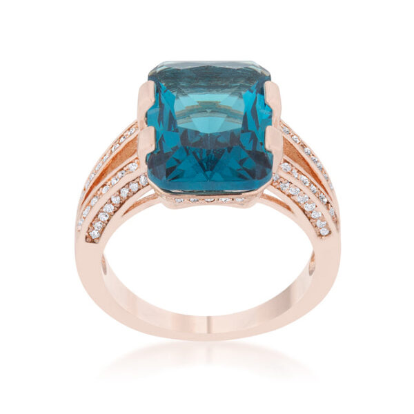 Rose goldtone plated cocktail ring with a large aqua cubic zirconia in a prong setting