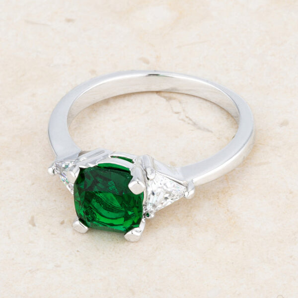 Rhodium plated cushion cut CZ ring displayed on a flat surface