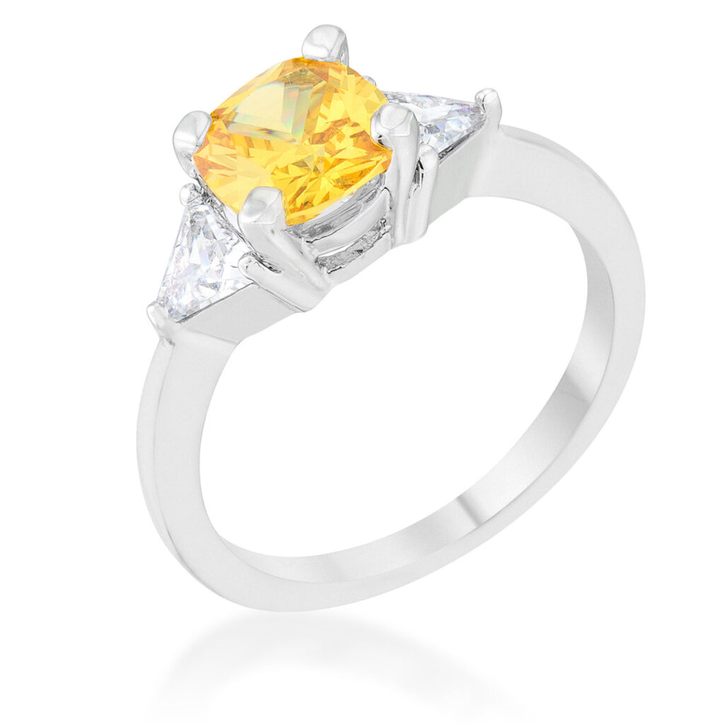 Rhodium plated over lead free alloy (brass) ring with All Clear cushion- and trillion-cut cubic zirconia in prong settings.
