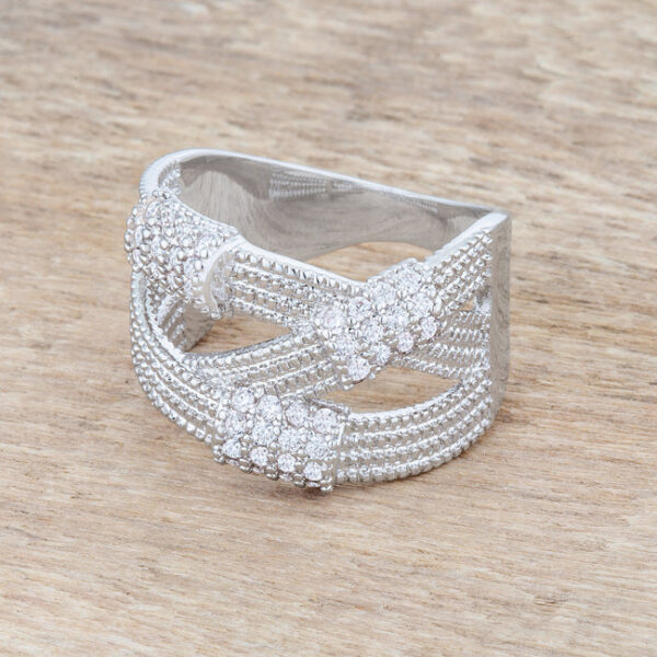 Pink round cubic zirconia in a pave setting on a wide cable statement ring.