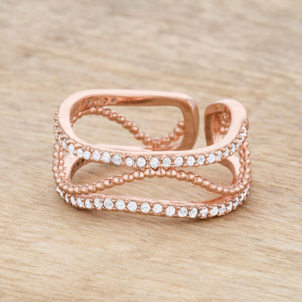 Classic abstract cuff ring in rosegold plated over lead free alloy (brass) with 0.5 ct total carat weight cubic zirconia.