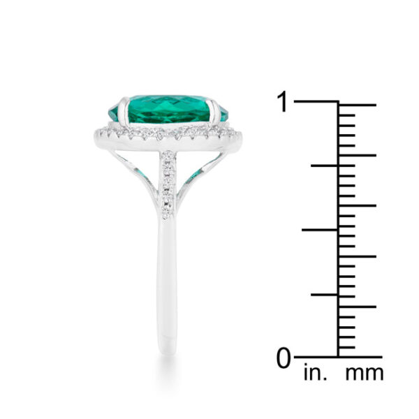 Rhodium plated over lead free alloy (brass) ring with blue and green round cubic zirconia and 7.3 ct total carat weight.