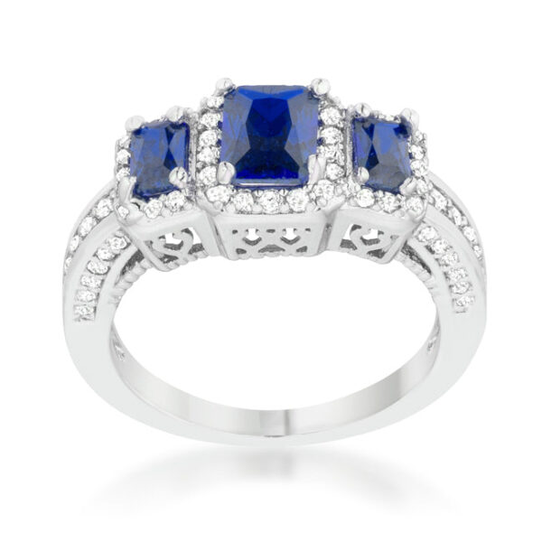 Rhodium plated over lead free alloy (brass) classic trio ring with sapphire-colored cubic zirconia.