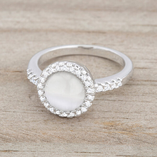 Rhodium plated over lead free alloy (brass) classic ring set with round, all-clear cubic zirconia.