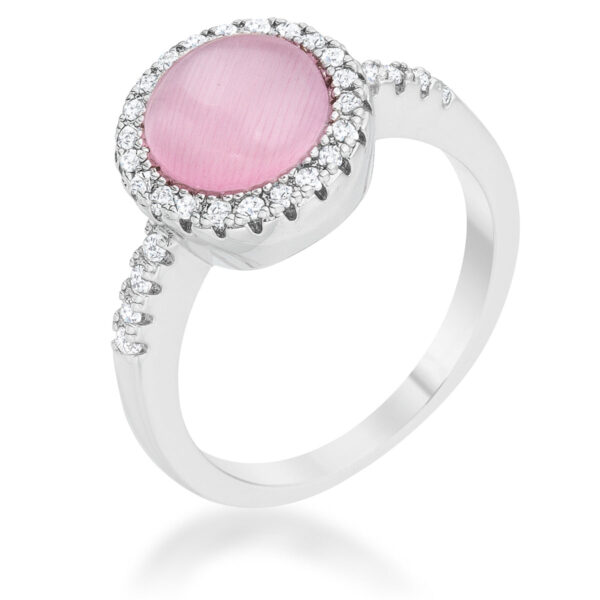 Classic ring with round all clear cubic zirconia in a pave setting and a rhodium plated over lead free alloy (brass) band.