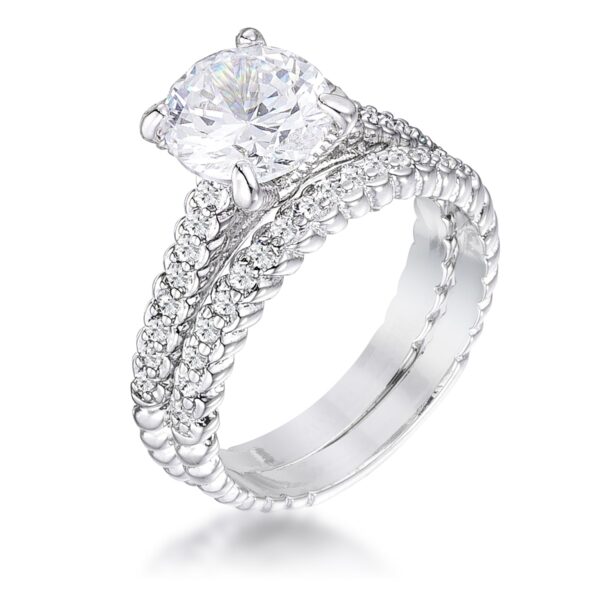 Rhodium plated over lead free alloy (brass) baroque wedding set with round cubic zirconia in prong settings.