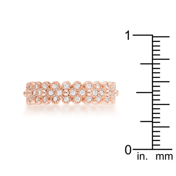 Textured bezel setting on a rose gold tone over lead free alloy (brass) ring with round cubic zirconia.