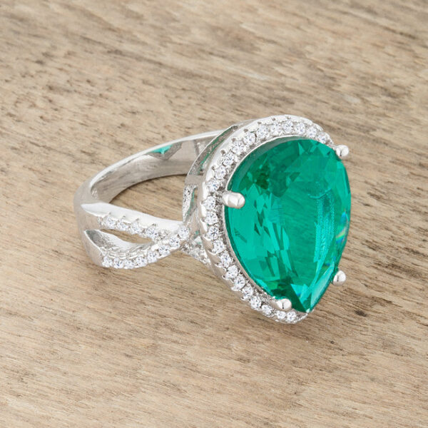 Cocktail ring with a teardrop design, clear round cubic zirconia in pave, and a 3mm band.