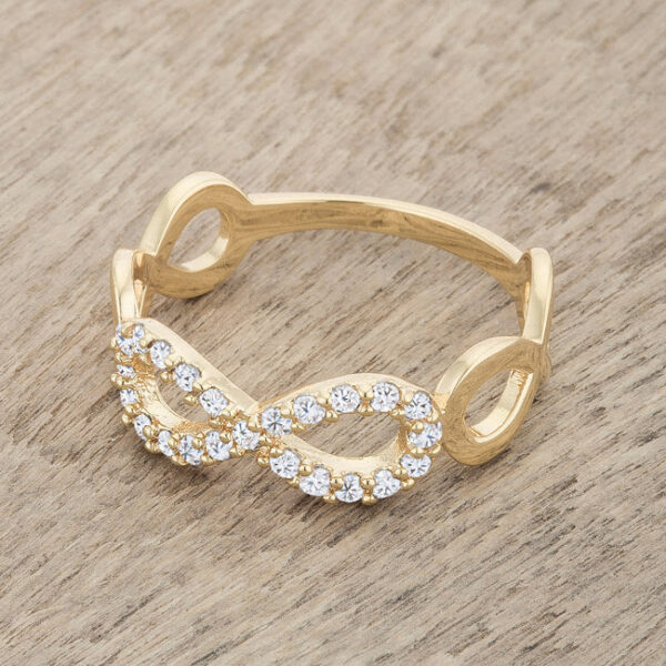 Infinity ring in gold tone over lead free alloy (brass) featuring round cubic zirconia in a pave setting.