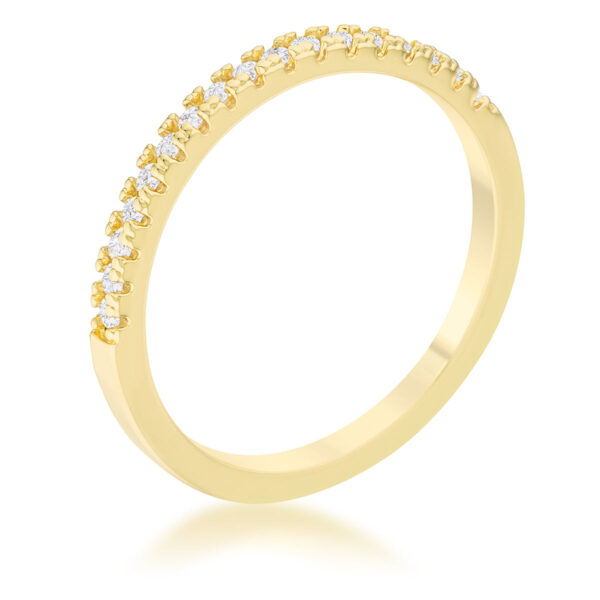 Delicate band ring in gold tone over lead free alloy (brass) with round clear cubic zirconia in a channel setting.