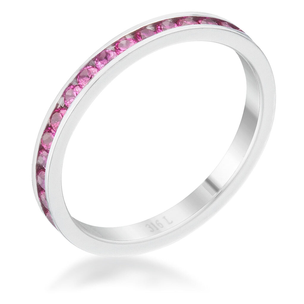 Ruby-colored cubic zirconia eternity band in silver tone over stainless steel with round stones in a channel setting.