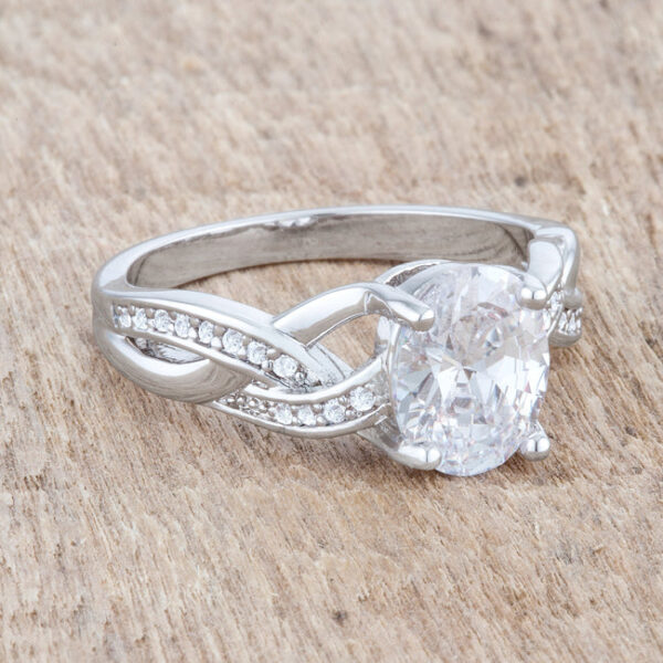 Round 1.15 Mm cubic zirconia in pave on a classic oval ring of rhodium plated over lead free alloy (brass).