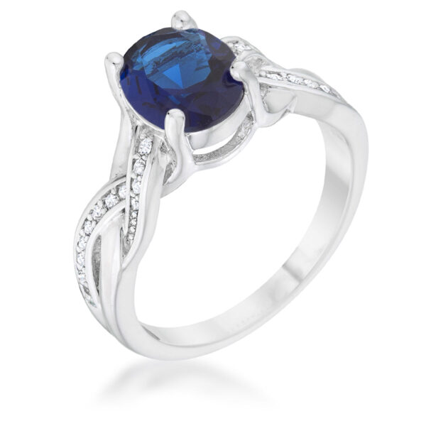 Classic oval ring in rhodium plated over lead free alloy (brass) with round pave set sapphire-colored cubic zirconia.