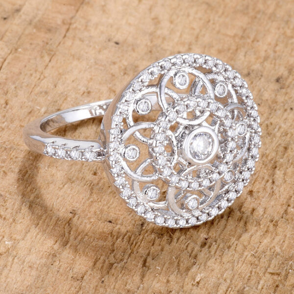 Classic interlocking circles ring in rhodium plated over lead free alloy (brass) with round 2.5mm prong-set cubic zirconia and 0.5 ct total weight.