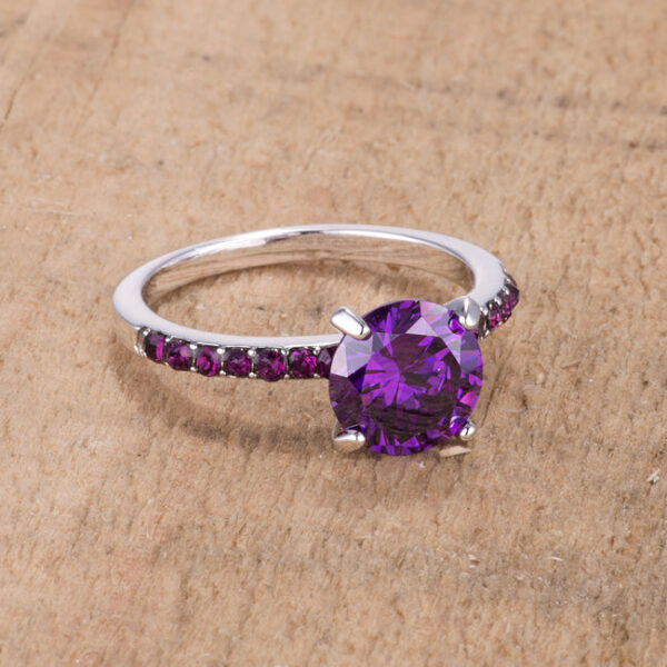 Round amethyst-colored cubic zirconia Pave ring, 2mm wide, rhodium plated over lead free alloy (brass).
