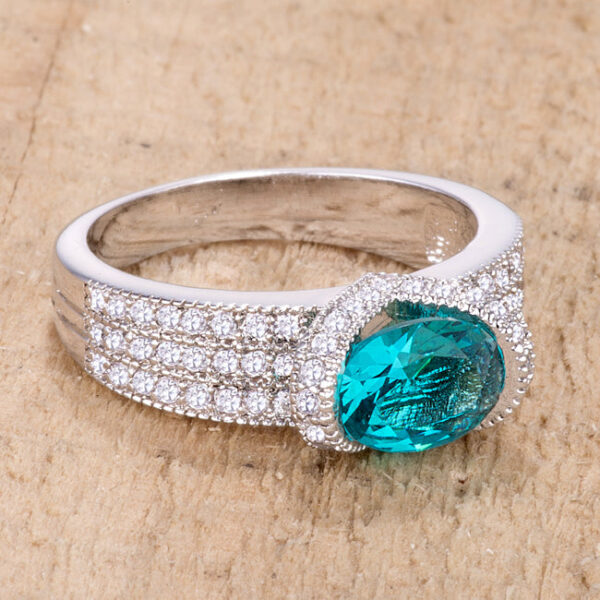 Aqua oval cubic zirconia ring with an 8.5mm X 6mm stone in a prong setting.