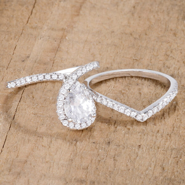 Side angle of the rhodium plated chevron wedding set showing band width and stone placement