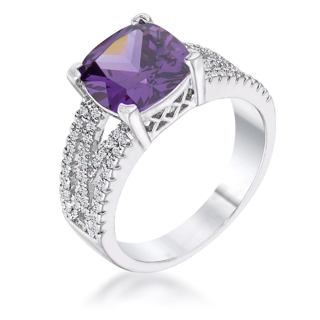 Silvertone ring with a large amethyst-colored cubic zirconia stone set atop a criss-cross band