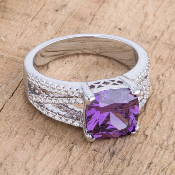 Side angle of the silvertone ring showing the criss-cross band detail and stone height