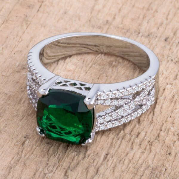 Classic criss-cross ring with 9mm and .8mm cushion- and round-cut cubic zirconia, rhodium plated over lead free alloy (brass).