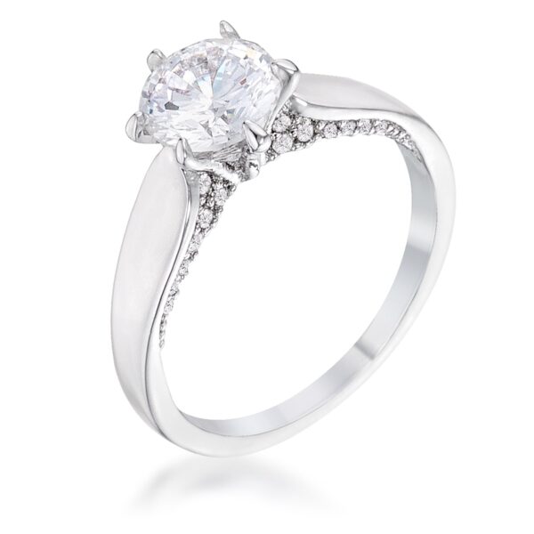 Round cubic zirconia prong-set solitaire ring in rhodium plated over lead free alloy (brass).