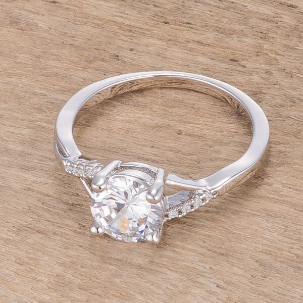 Classic rhodium plated over lead free alloy (brass) ring with round cubic zirconia and prong settings.